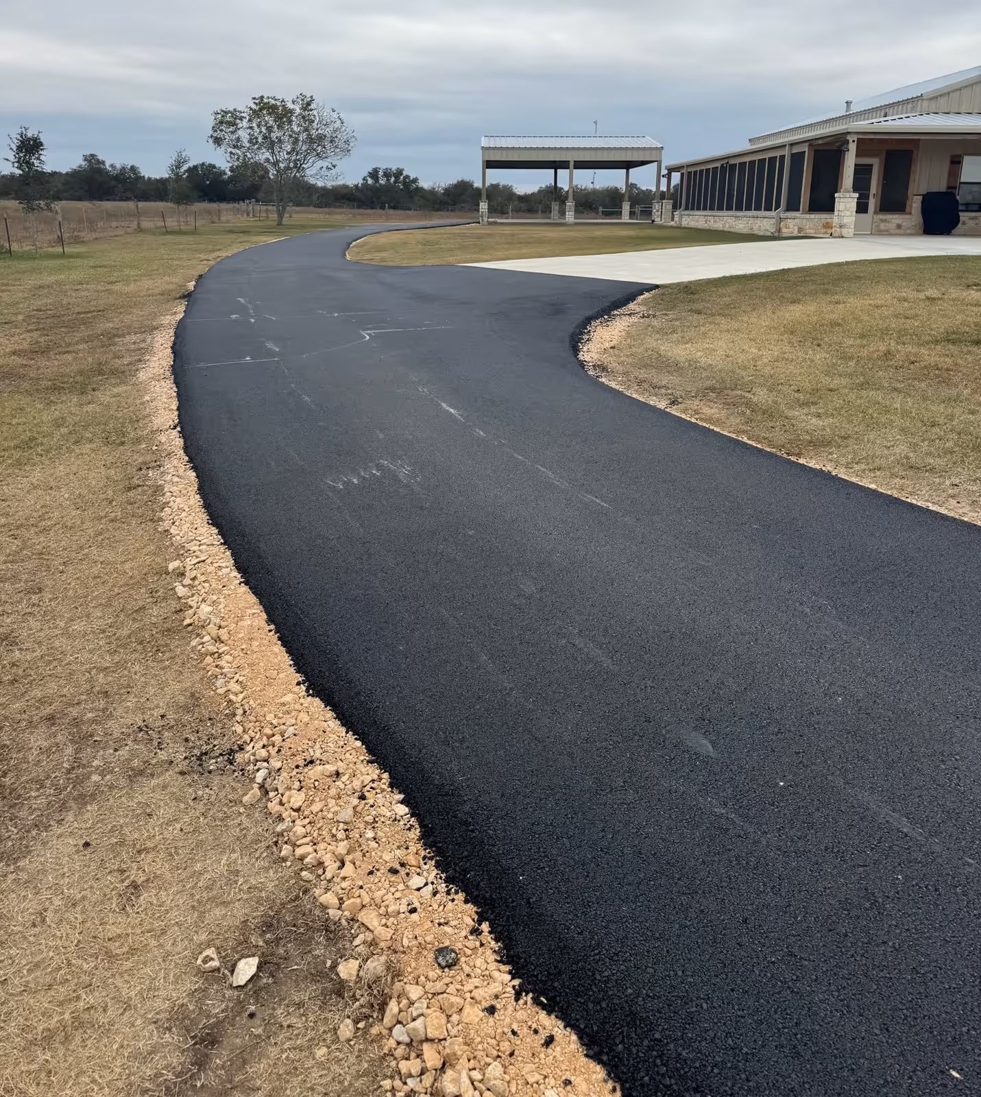 Driveway after asphalt paving by Mike & Martin's Asphalt