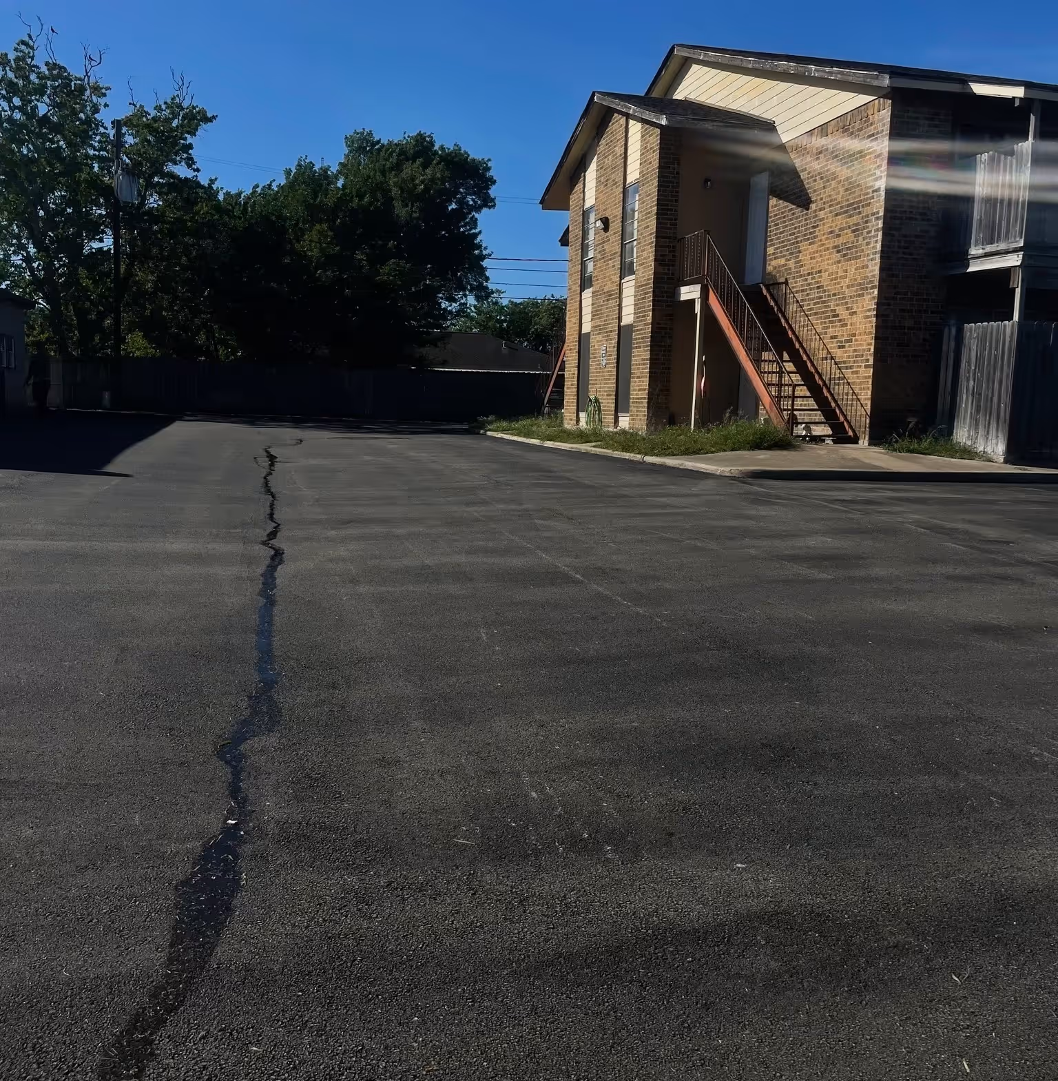 Driveway after asphalt paving by Mike & Martin's Asphalt