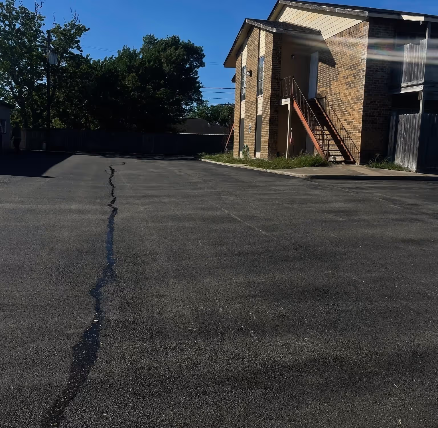 Driveway after asphalt paving by Mike & Martin's Asphalt